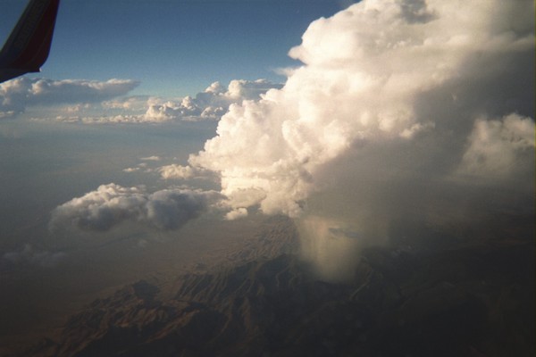 rain cloud attached to desert mountain