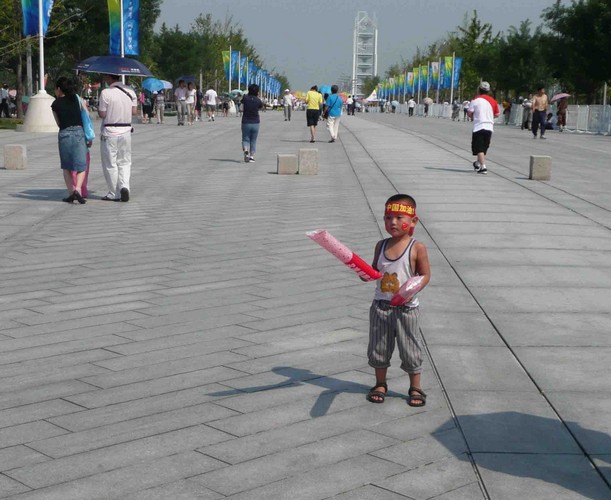child with toy torch, Beijing Olympics 2008